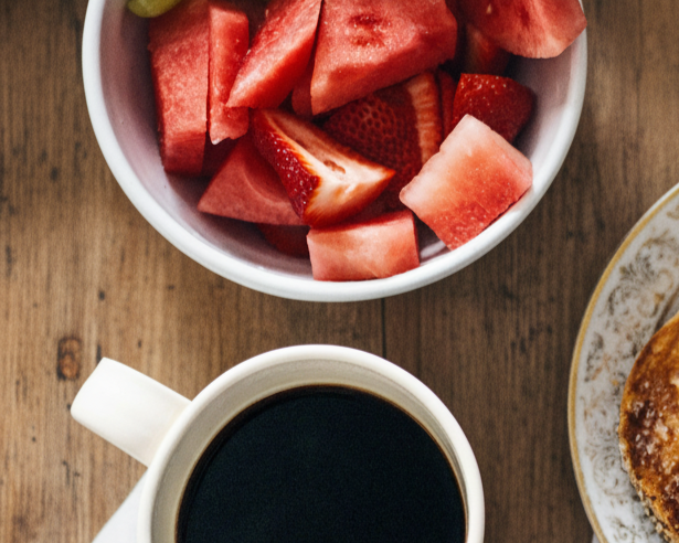 Breakfast scene with wooden background